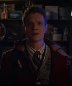 Patrick Gibson The Portable Door 2023 Paul Carpenter Brown Coat.