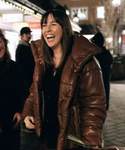 Katie Burrell Weak Layers 2024 Brown Puffer Jacket