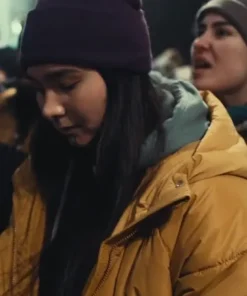 Annie Kowtok True Detective S04 Yellow Puffer Coat 2024