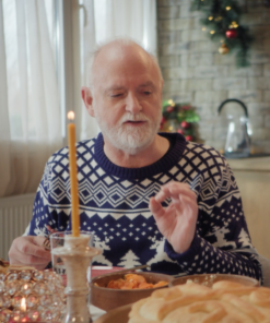 A European Christmas 2024 Paul Murphy Blue Sweater