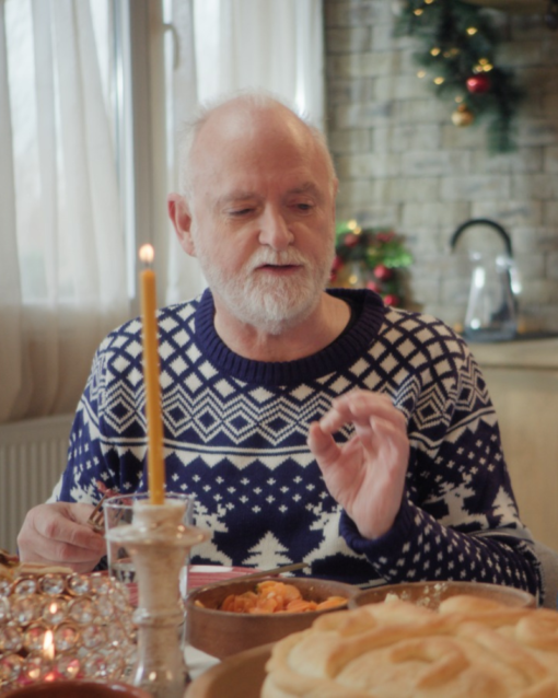 A European Christmas 2024 Paul Murphy Blue Sweater