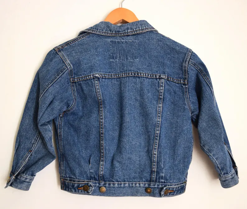 Vintage 1990s kid's medium blue denim jacket Vintage 1990s kid's medium blue denim jacket